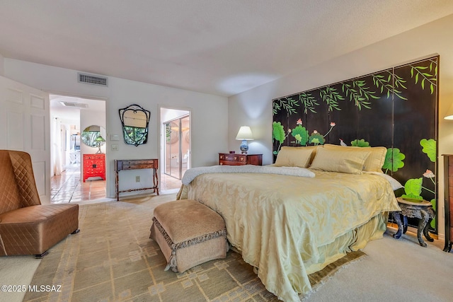 bedroom featuring visible vents and carpet