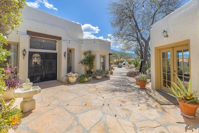 view of patio / terrace featuring french doors