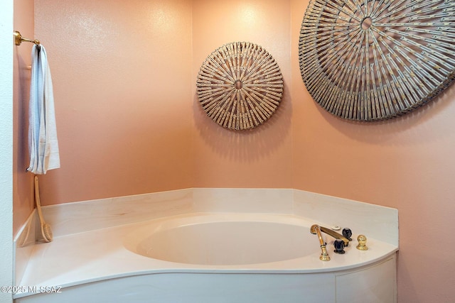 bathroom featuring a bath
