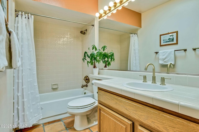 full bath featuring toilet, shower / bath combo with shower curtain, tile patterned flooring, and vanity