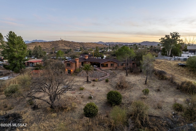 aerial view at dusk with a mountain view