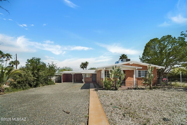 view of front facade with a carport