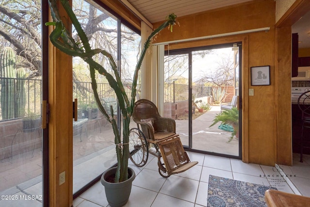 entryway featuring light tile patterned floors