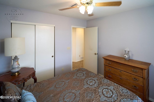 bedroom featuring a closet and a ceiling fan