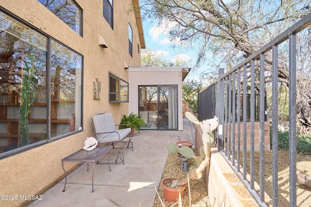 view of patio / terrace featuring stairway