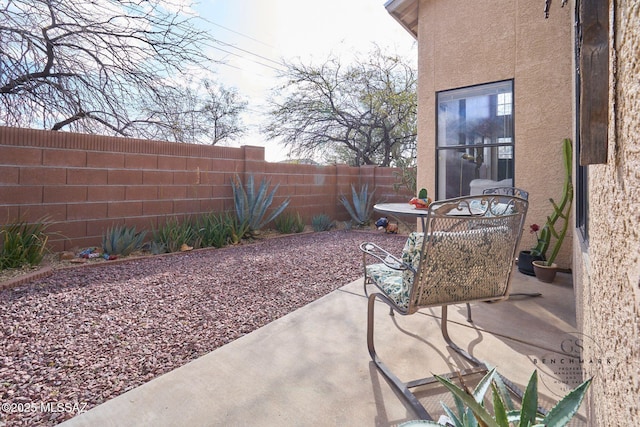 view of patio with a fenced backyard