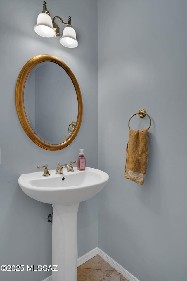 bathroom with sink and tile patterned floors