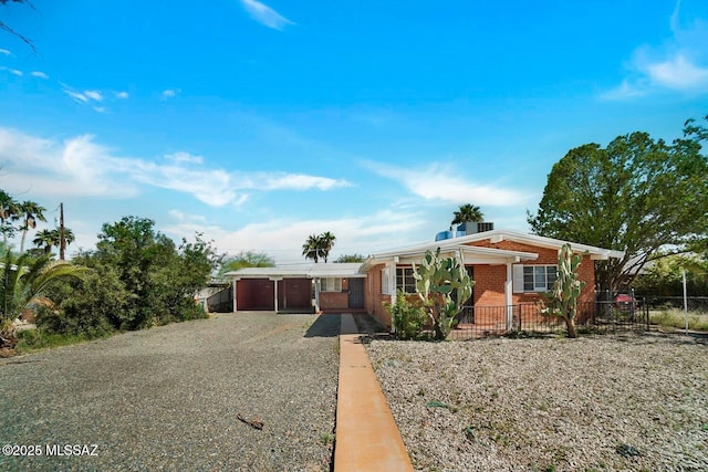 view of front of house with a carport