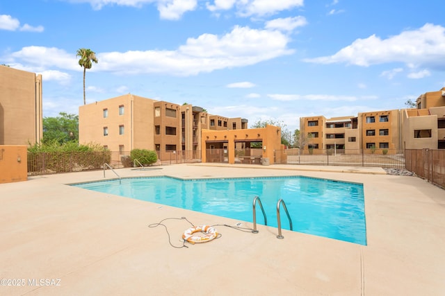 view of pool featuring a patio area