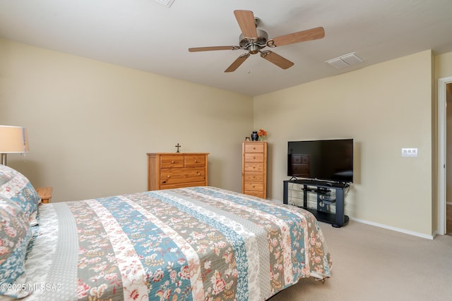 bedroom featuring a ceiling fan, light colored carpet, visible vents, and baseboards