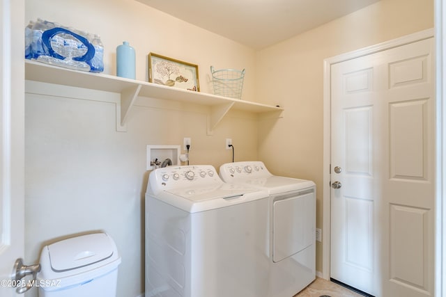 laundry area featuring laundry area and washer and clothes dryer