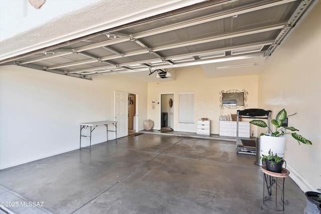 garage featuring a garage door opener
