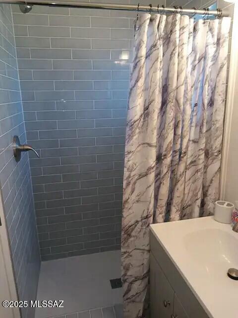 bathroom featuring sink and walk in shower