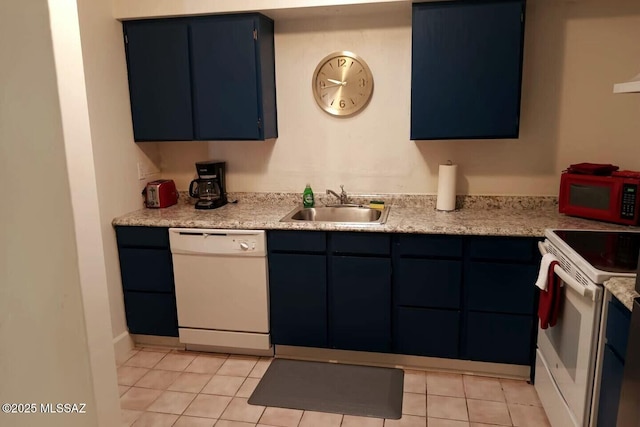 kitchen with sink, white appliances, blue cabinetry, and light tile patterned flooring