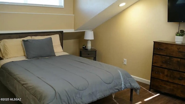 bedroom featuring dark hardwood / wood-style floors