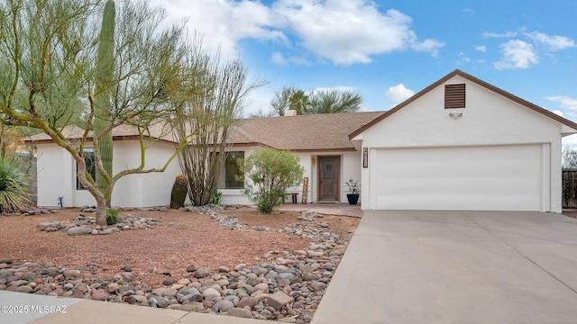 ranch-style home featuring a garage