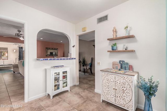 interior space with light tile patterned floors