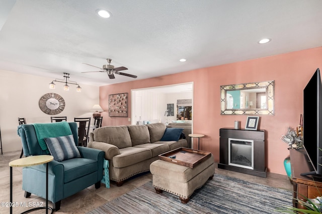 living room featuring ceiling fan