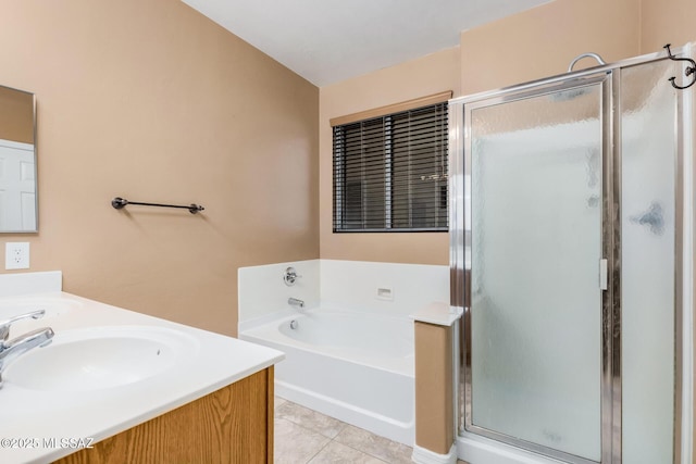 bathroom featuring vanity, tile patterned floors, and plus walk in shower