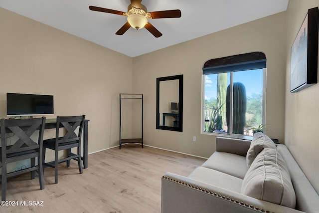 office area with light hardwood / wood-style floors and ceiling fan