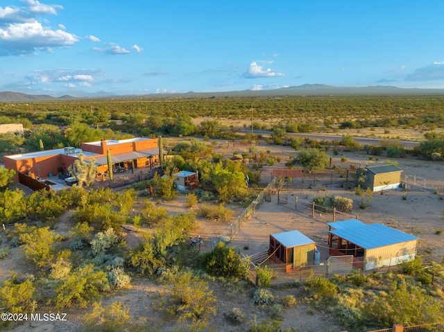 drone / aerial view featuring a mountain view