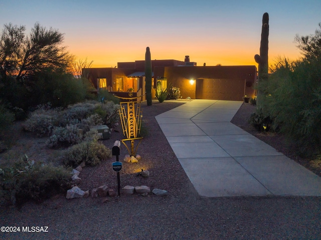 adobe home with a garage