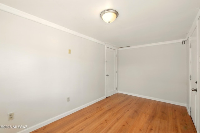 816 W 11th St, Safford, AZ 85546 - empty room with light wood-style floors and baseboards