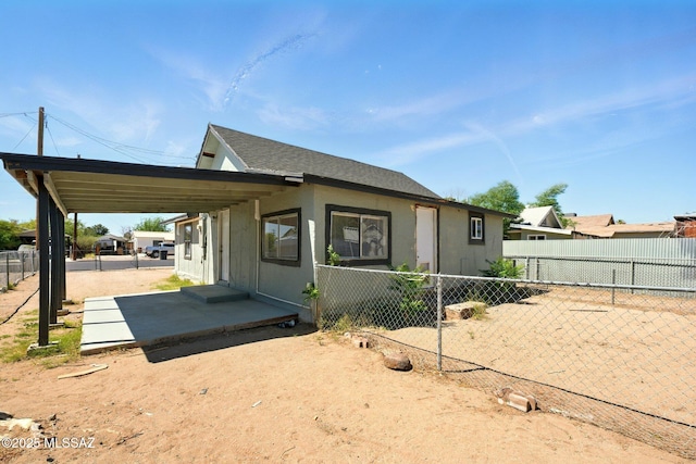 816 W 11th St, Safford, AZ 85546 - view of property exterior featuring fence and roof with shingles