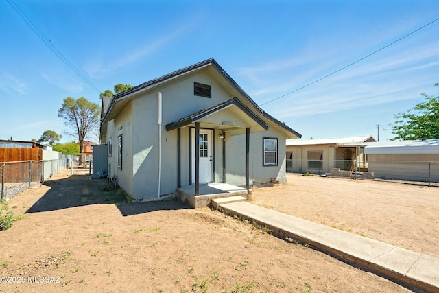 816 W 11th St, Safford, AZ 85546 - view of front of house featuring fence and stucco siding