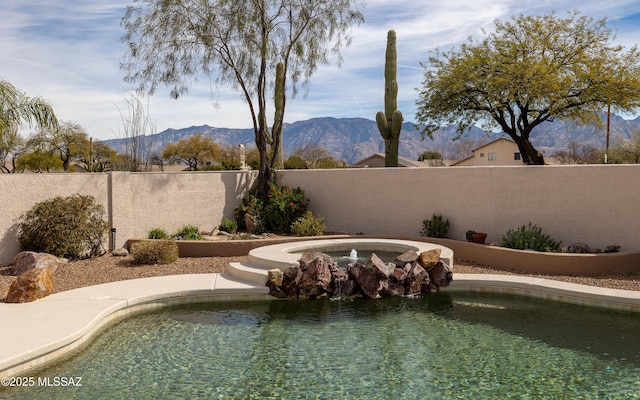 view of pool featuring a mountain view