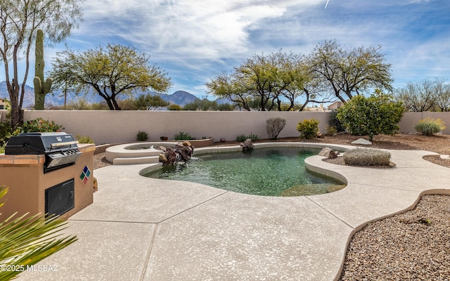 view of pool featuring area for grilling and a patio area