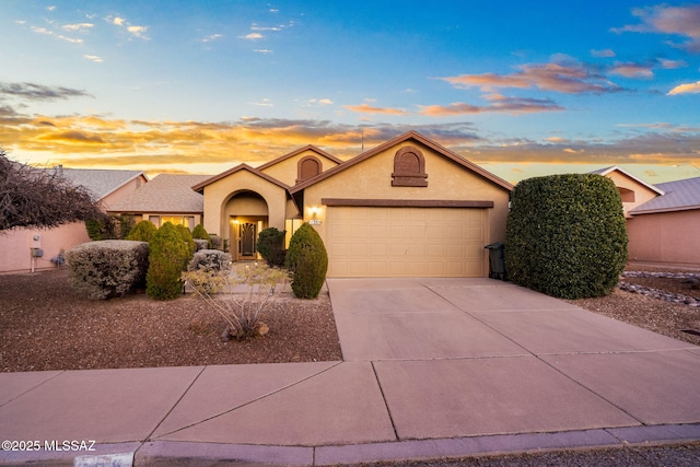 view of front of property featuring a garage