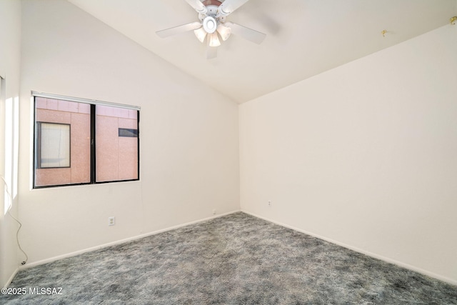 carpeted empty room featuring lofted ceiling and ceiling fan