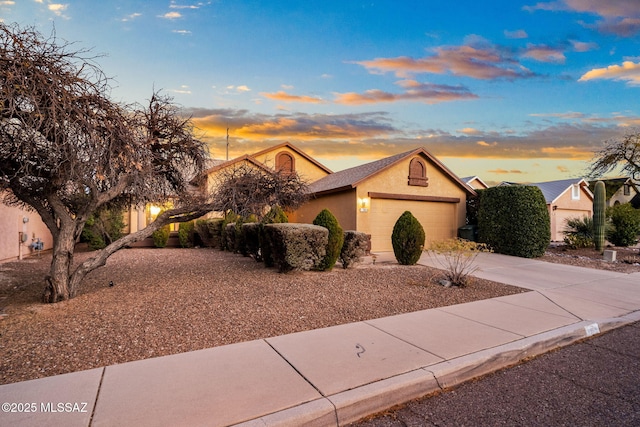 view of front of property featuring a garage