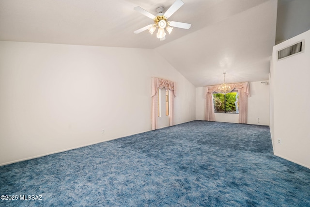 carpeted spare room featuring vaulted ceiling and ceiling fan