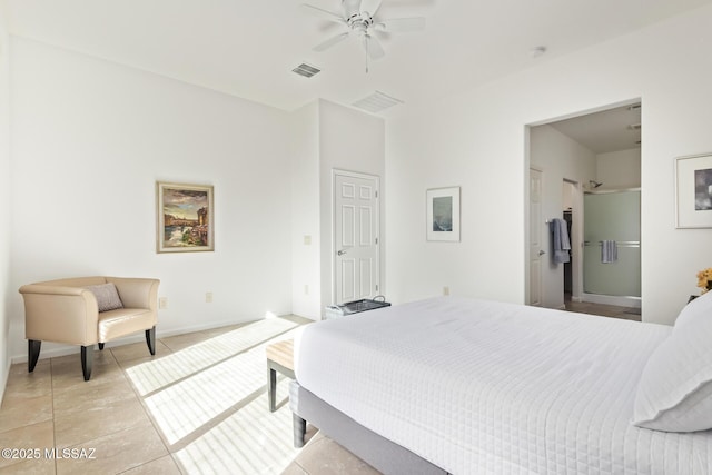 60437 E Arroyo Vista Dr, Oracle, AZ 85623 - bedroom with light tile patterned floors, baseboards, and a ceiling fan