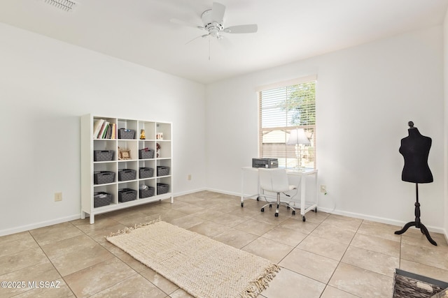 60437 E Arroyo Vista Dr, Oracle, AZ 85623 - tiled office with a ceiling fan and baseboards