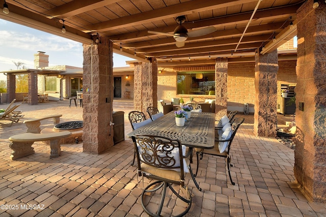 view of patio featuring ceiling fan