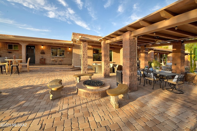 view of patio featuring a fire pit