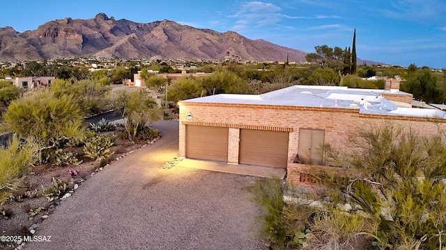 exterior space featuring a mountain view