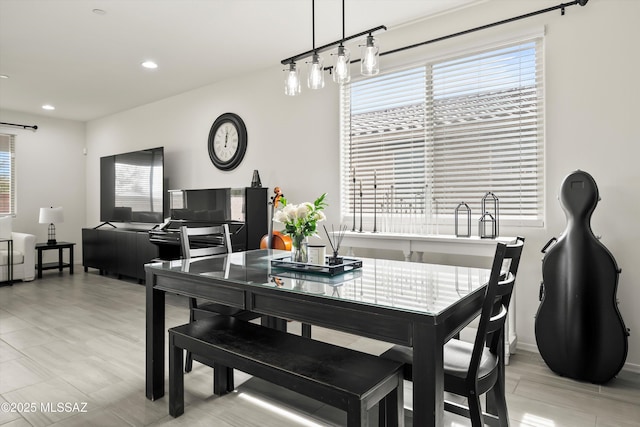 dining room with recessed lighting