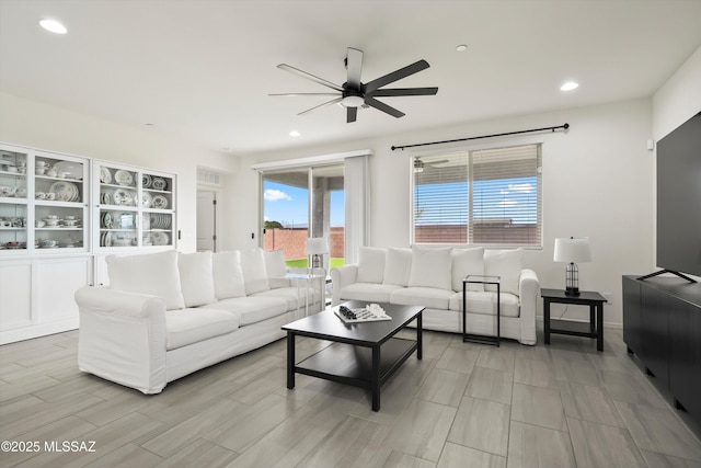 living room featuring ceiling fan, wood finish floors, and recessed lighting