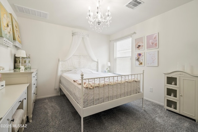 bedroom with an inviting chandelier, visible vents, and dark carpet