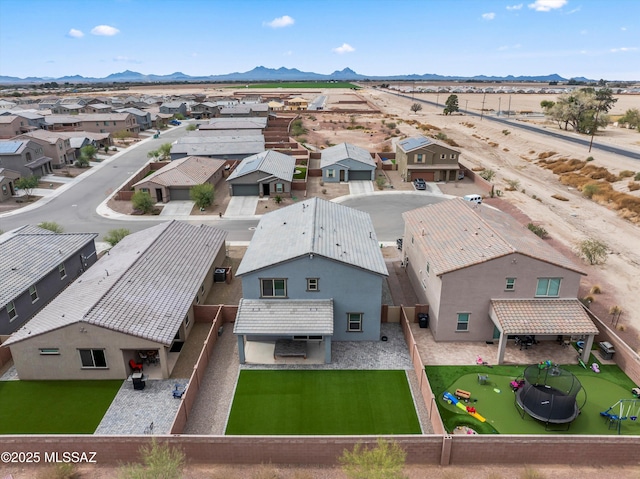 bird's eye view with a residential view and a mountain view