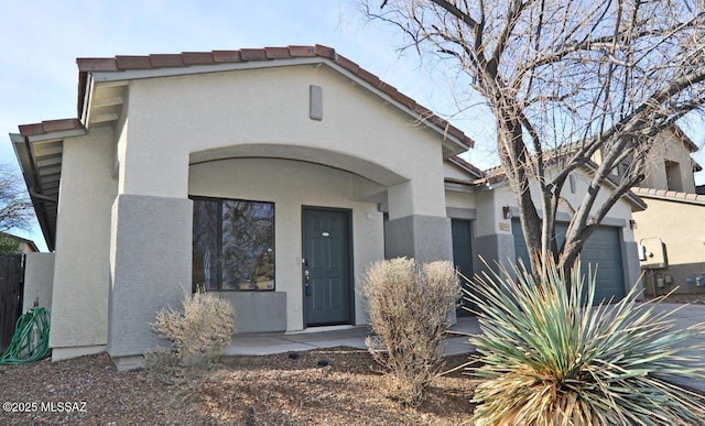 view of front of property with a garage