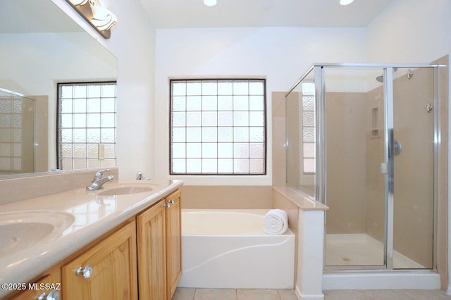 bathroom with tile patterned floors, plus walk in shower, and plenty of natural light