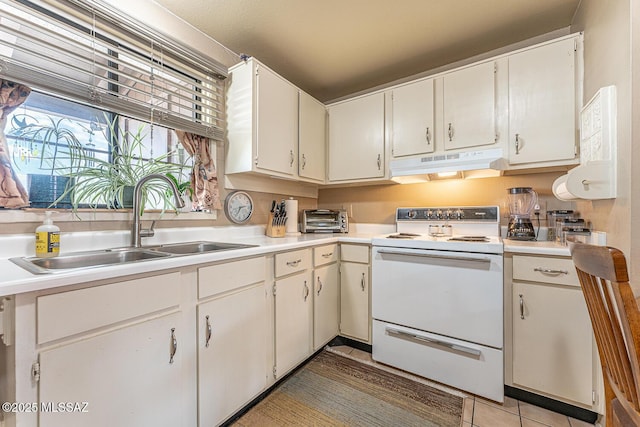 kitchen with white cabinetry, sink, and white range with electric stovetop