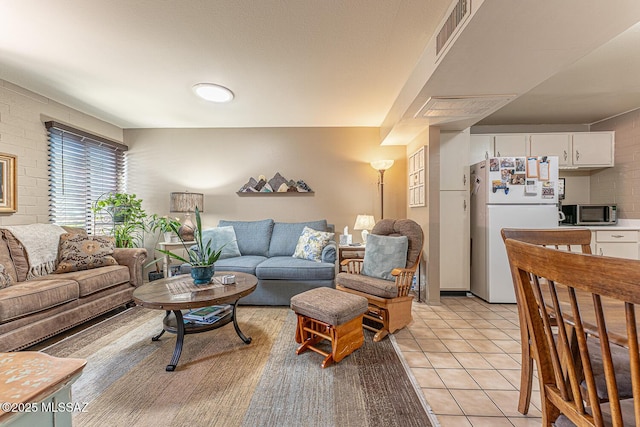 living room featuring light tile patterned floors