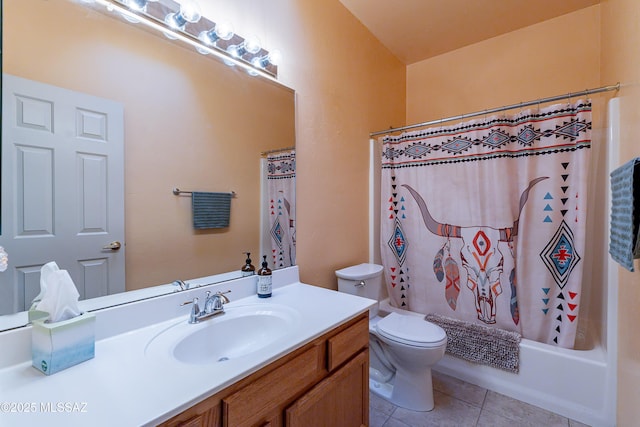 full bath with tile patterned flooring, toilet, vanity, and shower / bath combo