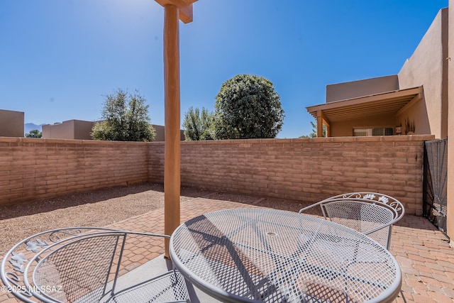 view of patio / terrace with outdoor dining area and a fenced backyard